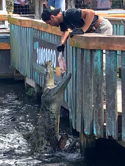 a man holding a fish